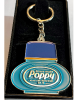 Poppy Sleutelhanger Metaal Freesia, een geurige en elegante sleutelhanger met freesia-geur, verkrijgbaar bij Truck-Shop.nl.